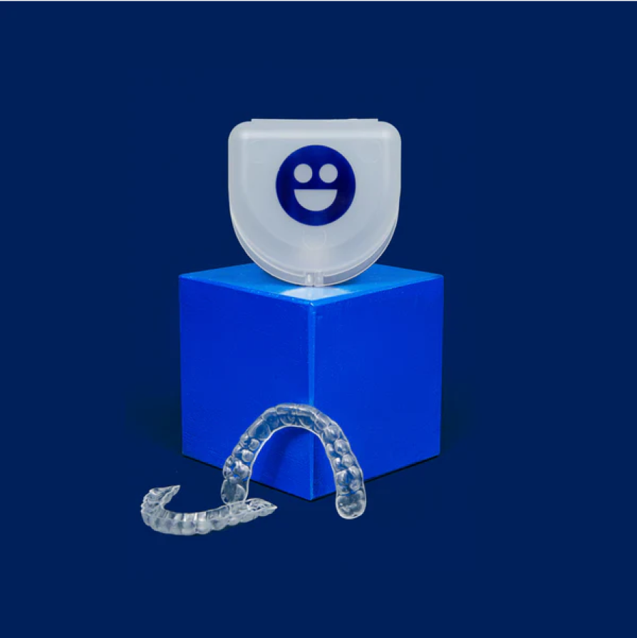 joyful smiley face on a blue box cheeky night guards-Cheeky